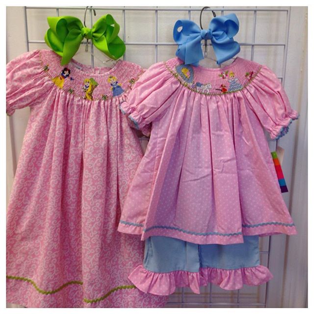 Planning a Disney trip? Check out these cute Disney Princess smocked outfits!#refinerykids #225 #batonrouge #disneyprincess #idratherbeatdisney